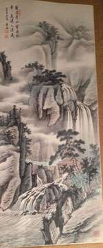 Long scroll with Chinese text at the top showing many waterfalls cascading around a few trees