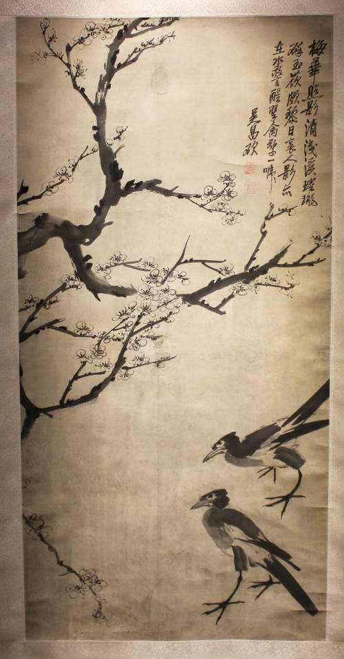 Hanging scroll showing two kingfishers on bottom right with prunus blossoms and branches on left stretching across the paper with three and a quarter columned calligraphy inscription on the top right.