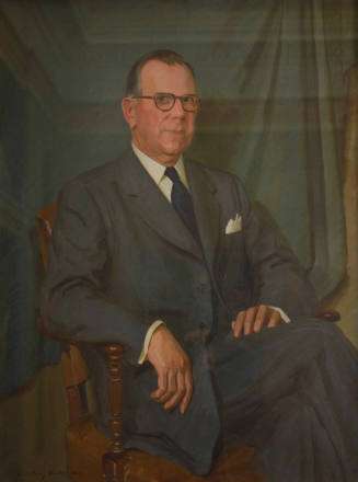 Portrait of Friley, seated in chair