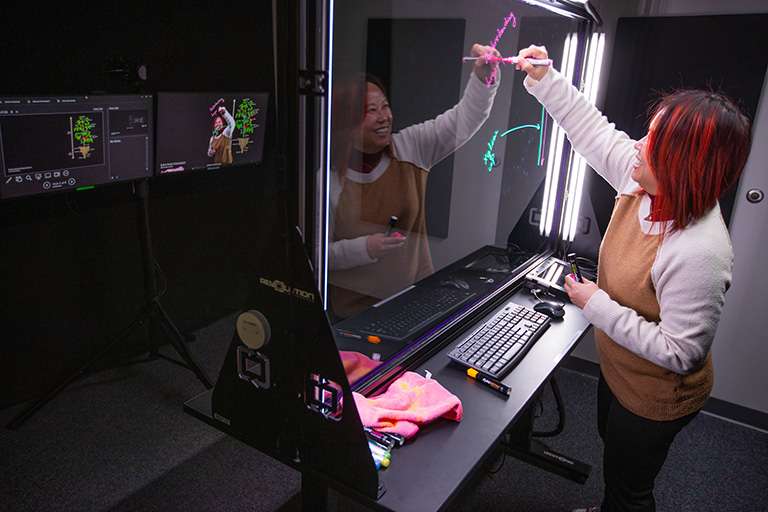 Yen Verhoeven demonstrates the LightBoard.